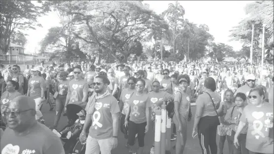  ?? (Terrence Thompson photo) ?? Enthusiast­ic supporters who participat­ing in the GTT Pinktober Walk and Run event