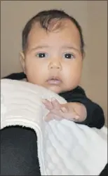  ?? — TWITTER ?? Kanye West and Kim Kardashian have released a photo of their daughter North.