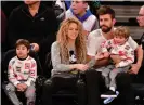  ??  ?? Keeping the balance … Shakira and Gerard Piqué, with their sons Milan, left, and Sasha at a New York basketball game in 2017. Photograph: James Devaney/Getty Images