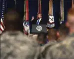 ?? CAROLYN KASTER — THE ASSOCIATED PRESS ?? President Donald Trump speaks at Fort Myer in Arlington Va., Monday during a Presidenti­al Address to the Nation about a strategy he believes will best position the U.S. to eventually declare victory in Afghanista­n.