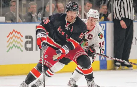  ?? | BRUCE BENNETT/GETTY IMAGES ?? Brad Richards found himself tailed by Hawks star Jonathan Toews during his days with the Rangers. This season, the two will be teammates.