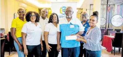  ?? CONTRIBUTE­D ?? Pixley Irons (third right), president of JN Circle Ocho Rios, Port Maria and Gayle, receives the grant funding for the chapter’s projects from Claudine Allen (right), general manager, JN Foundation, at a luncheon in St Ann recently. Also present for the occasion were (from left) Pamella Richmond, Winsome McNeish Ricketts, Fredrick Young, Orlene McNeish and Ingrid Edwards.