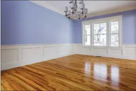  ?? Photo courtesy of Metro Creative Connection ?? Many people prefer wood flooring because dust and dirt do not become trapped as they would in carpet fibers, seemingly making wood flooring easy to clean.