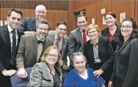  ?? Project for the Innocent at Loyola Law School ?? MARIA MENDEZ, seated at right, shown with her legal team, spent 11 years behind bars in connection with the death of her 9-month-old grandson in 2006.