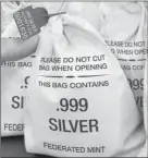  ??  ?? SILVER HITS ROCK BOTTOM: Everyone’s scrambling to get the Silver Vault Bags each loaded with 10 solid .999 pure Silver State Bars before they are all gone. That’s because the standard State Minimum set by the private Federated Mint dropped 42%, going from $ 50 per bar to just $ 29, which is a real steal.