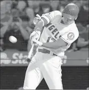  ?? Jayne Kamin-Oncea Getty Images ?? SHOHEI OHTANI hits a solo home run, his 21st of the year, on the first pitch he sees in the first inning.