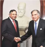  ??  ?? CHANDRA TAKES CHARGE: New Tata Sons Chairman N Chandrasek­aran with Ratan Tata at Bombay House. The latter quit the board on Tuesday.