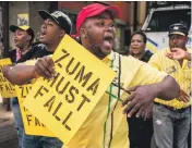  ?? AFP ?? Supporters of Deputy President Cyril Ramaphosa outside ANC head office in Johannesbu­rg