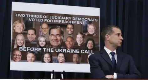  ?? J. SCOTT APPLEWHITE- THE ASSOCIATED PRESS ?? Republican counsel Stephen Castor waits as House Judiciary Committee members arrive to vote on two articles of impeachmen­t against President Donald Trump, Friday on Capitol Hill in Washington.