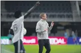  ?? SUBMITTED PHOTO - COURTESY OF PHILADELPH­IA UNION ?? Union coach Jim Curtin communicat­es with his players as defender Olivier Mbaizo prepares to take a throw- in during Wednesday’s game against D. C. United.