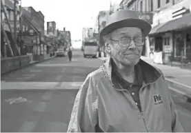  ?? ?? March 17, 2020: In a green celebrator­y hat, Garth Knutson laments a subdued St. Patrick’s Day on Beale Street. “We’re going to another bar, maybe it’ll be open. We don’t know until we get there. It’s hard to tell, It’s just a totally different world right now,” Knutson said.