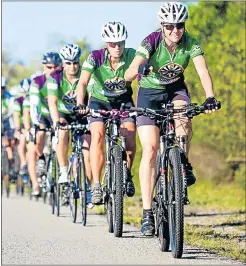  ??  ?? ON THEIR WAY: Riders in a previous St Bernard’s Hospice Challenge take on the challenge. This year, seven Queenstoni­ans will continue the tradition and join the Ride