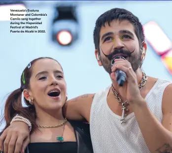  ?? ?? Venezuela’s Evaluna Montaner and Colombia’s Camilo sang together during the Hispanidad Festival at Madrid’s Puerta de Alcalá in 2022.