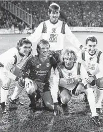  ??  ?? After the collision with Alex Mcleish left Terry Butcher with a broken leg, he was back to play in the Aberdeen defender’s Testimonia­l alongside (from left) Roy Aitken, Kenny Dalglish and Rod Stewart, and he went on to enjoy more success with Rangers