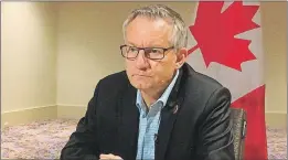  ?? CP PHOTO ?? Trade Minister Ed Fast speaks to reporters in Atlanta Friday where he's negotiatin­g the TransPacif­ic Partnershi­p agreement.