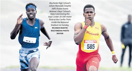  ?? RICARDO MAKYN/ MULTIMEDIA PHOTO EDITOR ?? Muchette High School’s Johan-Ramaldo Smythe (left) chases home Wolmer’s Boys’ School’s Gary Card during the boys’ under-20 200-metre final at the Carifta Trials inside the National Stadium on Sunday.