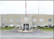  ?? Westside Eagle Observer/MIKE ECKELS ?? The stucco on the outside of Decatur City Hall received a much-needed cleaning on Aug. 17 after years of dust and grime covered the 85-year-old structure.