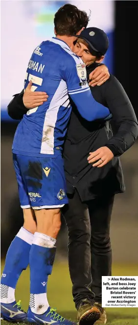  ?? Dan Mullan/Getty Images ?? > Alex Rodman, left, and boss Joey Barton celebrate Bristol Rovers’ recent victory over Accrington