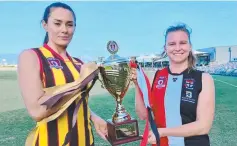  ??  ?? Manunda Hawks women's captain Mel Kelly with Cairns Saints captain Freya Reilly at Cazalys Stadium ahead of the 2021 grand final. Picture: Harry Murtough