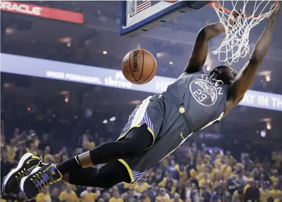  ?? AP FOTO ?? GREEN IS GO. Golden State Warriors forward Draymond Green scores an easy two against Portland in Game 2 of their West Conference Finals.