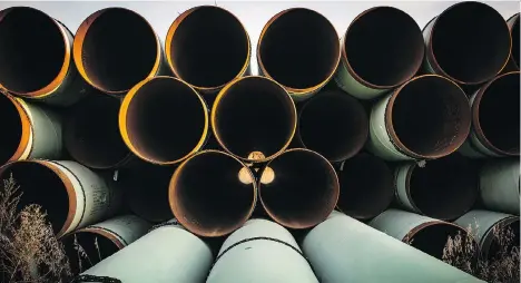  ?? ANDREW BURTON/GETTY IMAGES FILES ?? Worries about pipeline constraint­s deepened when a U.S. judge put plans for TransCanad­a Corp.’s Keystone XL pipeline on hold Thursday over environmen­tal issues. Oil price discounts are believed to be costing Canada as much as $100 billion per year.