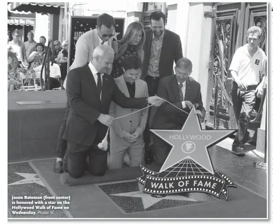  ?? Photo: IC ?? Jason Bateman ( front center) is honored with a star on the Hollywood Walk of Fame on Wednesday.