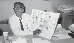  ?? THE ASSOCIATED PRESS ?? Bayard Rustin, deputy director of the planned march on Washington, points to a map showing the civil rights march plan during a news conference in New York on Aug. 24, 1963.