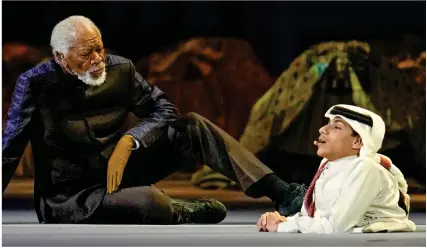  ?? ?? Awkward: Film star Morgan Freeman with Ghanim al Muftah in cringe-inducing performanc­e