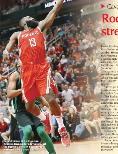  ?? Photo: VCG ?? James Harden of the Houston Rockets drives in for a layup against the Boston Celtics on Saturday in Houston, Texas.