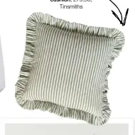  ??  ?? Green ticking frill cushion, £79.50, Tinsmiths