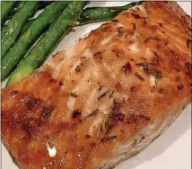  ??  ?? Chef Bob Brinson’s Maple Glazed Salmon.