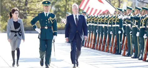  ?? — AFP ?? US Defence Secretary Jim Mattis reviews an honour guard during a welcoming ceremony at the Defence Ministry in Tokyo on Saturday.