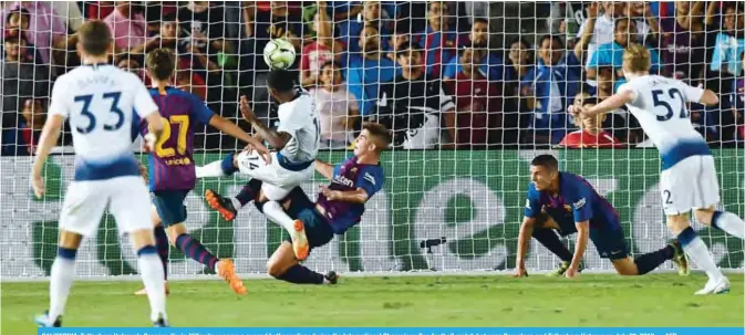  ?? —AFP ?? CALIFORNIA: Tottenham Hotspur’s Georges-Kevin N’Koudou scores a second half equalizer during the Internatio­nal Champions Cup football match between Barcelona and Tottenham Hotspur on July 28, 2018.