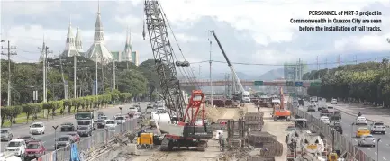  ??  ?? PERSONNEL of MRT-7 project in Commonweal­th in Quezon City are seen before the installati­on of rail tracks.