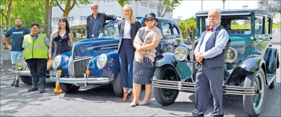  ?? PICTURE / PAUL BROOKS ?? Draped around the 1938 Dodge, 1939 Ford V8 and 1928 Chevrolet are (from left) Rahul Gujral (More FM), Pena Hikuwai (Maori Wardens), Kelly Scarrow and Geoff Follett (Mainstreet), Sarah Anderson (Bayleys), Glynis Robinson and Bruce Ardell (Wanganui VCC).