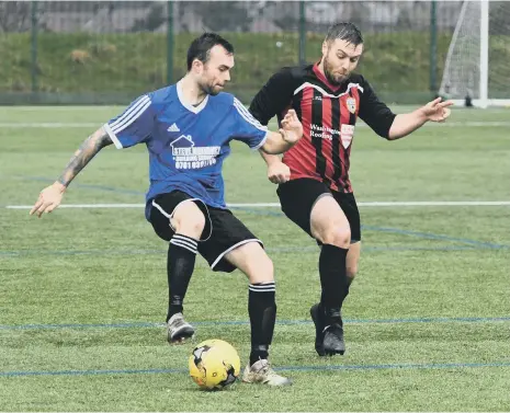  ??  ?? The Lansdown (blue) v Stella Dons (red/black) at Silksworth Sports Complex on Sunday.