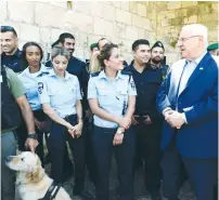  ??  ?? PRESIDENT REUVEN RIVLIN meets with soldiers and commanders near Damascus Gate yesterday.