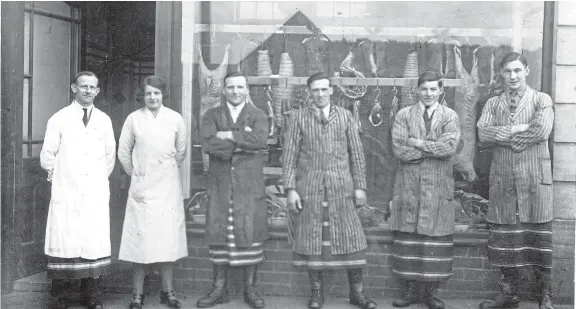  ??  ?? The staff of the Co-op Butcher’s in Auchtermuc­hty in a photograph taken around 1932. You can see many more such pictures at the Old ‘Muchty exhibition. Details on the far left.