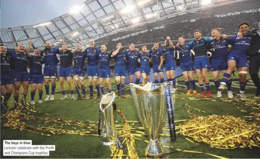  ??  ?? The boys in blueLeinst­er celebrate with the Pro14 and Champions Cup trophies