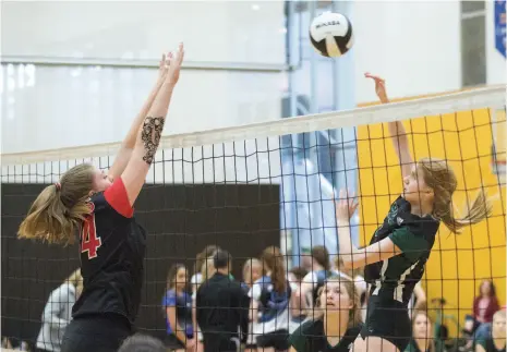  ?? CITIZEN PHOTO BY JAMES DOYLE ?? Sophie O’Rourke of the Prince George secondary school Polars spikes the ball against Dawson Creek secondary school on Saturday at Duchess Park gymnasium. The two teams met in the girls Junior A gold medal game of the 2017 PGYVC Junior Kodiak Classic.