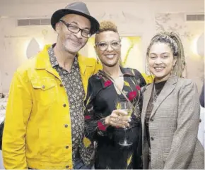  ??  ?? Author Sara Collins (centre) with fellow author Colin Grant and his daughter Jazz