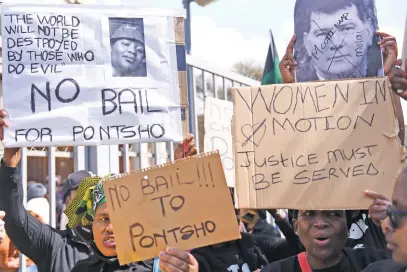  ?? Picture; Nigel ?? RAGE. Protesters outside the Vereenigin­g Magistrate’s Court earlier for the appearance of Pontso Mahlanka for the murder of Orange Farm children Mpho Makondo and her neighbour Simphiwe Mncina.