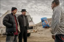  ?? FRITO-LAY VIA AP ?? This photo shows Aaron Paul, Bryan Cranston and Raymond Cruz in a scene from PopCorners 2023 Super Bowl NFL football spot.
