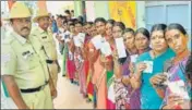  ?? PTI ?? Women wait for their turn at a booth in Mysore on Saturday.