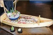  ?? IMAGE COURTESY OF SAIKO-I SUSHI LOUNGE & HIBACHI ?? Dad should go fishing with this delicious Saiko-i sushi boat.