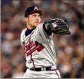  ?? RICK STEWART / GETTY IMAGES ?? John Smoltz pitches against the Blue Jays in the Skydome during Game 5 of the 1992 World Series.The Braves acquired Smoltz in August 1987 for pitcher Doyle Alexander.