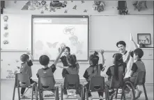  ?? PROVIDED TO CHINA DAILY ?? Children take offline classes offered by Rise Education Cayman Ltd, a Nasdaq-listed education company, in Beijing.