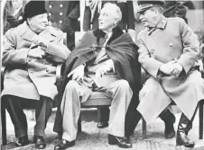  ?? STF/AFP/GETTY IMAGES ?? British Prime Minister Winston Churchill, U.S. President Franklin Delano Roosevelt and Secretary General of the Soviet Communist Party Josef Stalin appear at the start of the famous Yalta conference on Feb. 4, 1945, at the end of the Second World War. Churchill was effusive with his praise of Stalin in public, but was deeply suspicious of his motives.