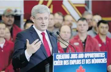  ?? JOHN WOODS/THE CANADIAN PRESS ?? Prime Minister Stephen Harper, seen at the opening of an expressway in Winnipeg Friday, continued to point the finger of blame for the Senate scandal at his former right-hand man, Nigel Wright, and at Sen. Mike Duffy.