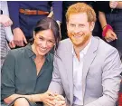  ??  ?? CHEERING US UP Meghan and Harry